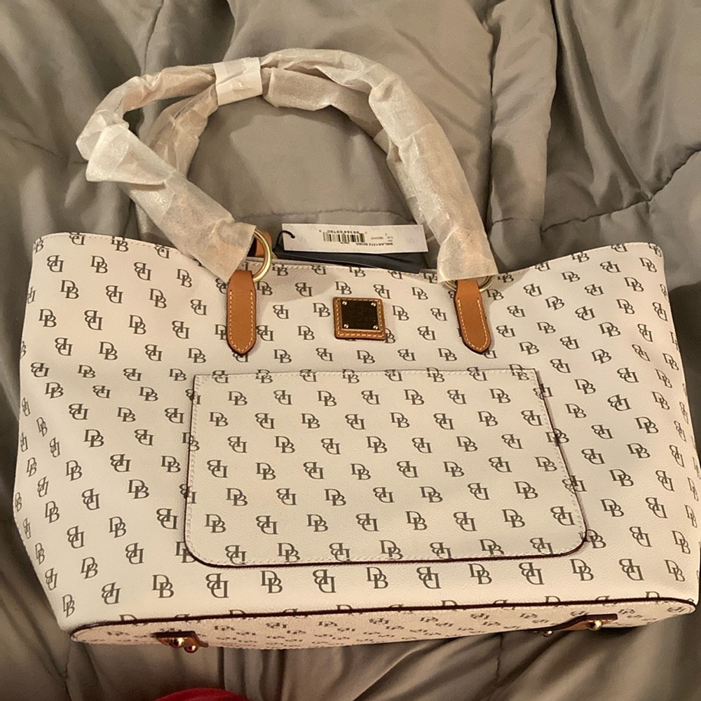 New With Tags Dooney & Bourke bone colored and red interior Tammy Tote.